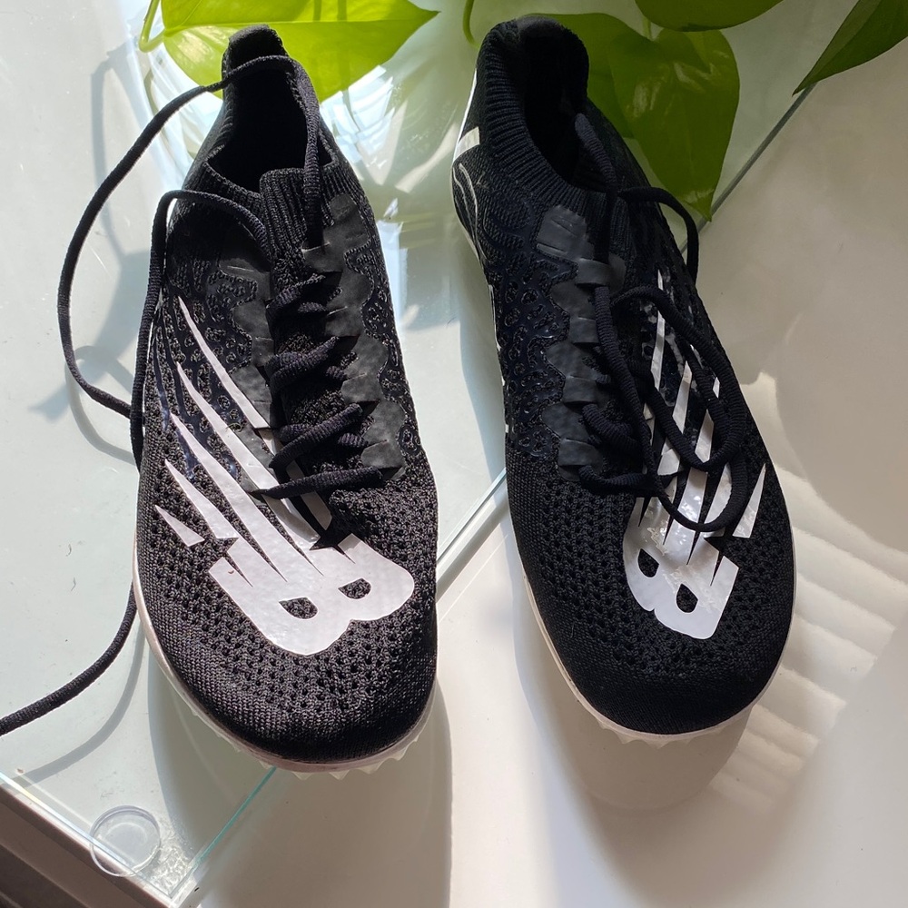 New Balance Black and White cleats LD 5000